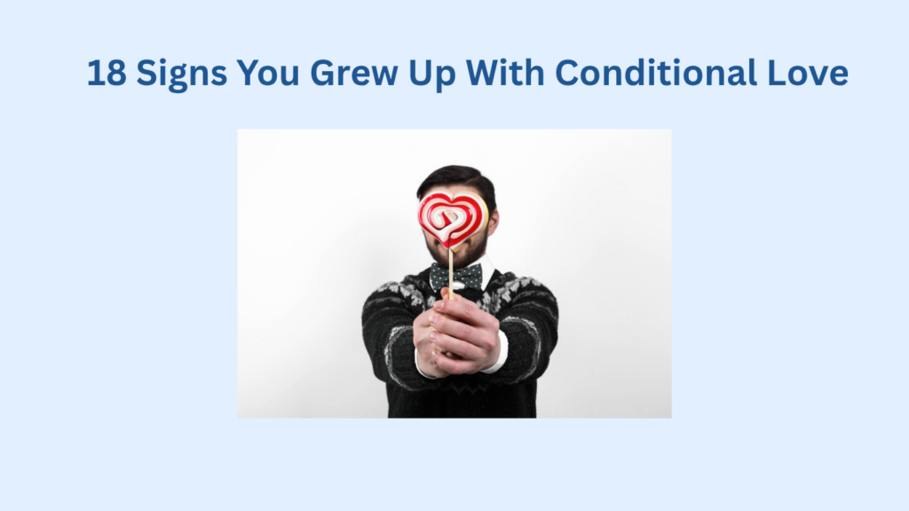 A person in a black sweater holds a heart-shaped lollipop toward the camera, with the text “18 Signs You Grew Up With Conditional Love” above.
