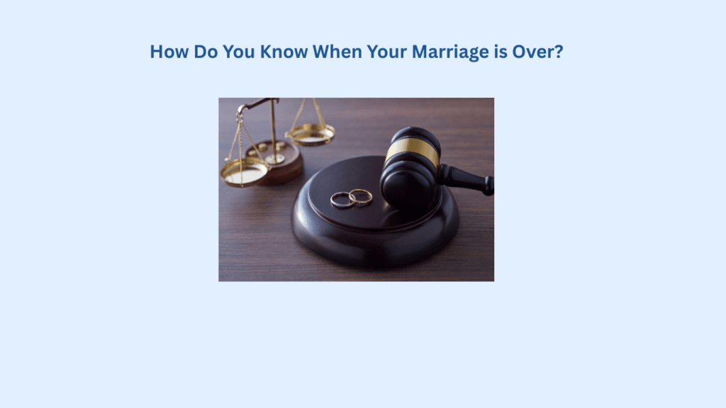 A gavel, two wedding rings, and a balanced scale rest on a wooden surface beneath the text, "How Do You Know When Your Marriage is Over?"