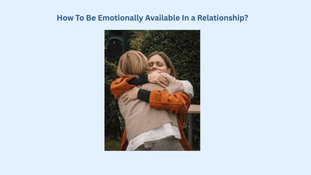 Two people stand outside and embrace each other in a hug, with greenery in the background. Text above them reads, "How To Be Emotionally Available In a Relationship?.